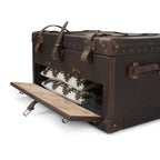 Leather Trunk in Dark Coffee Brown, angled view with drop-front drawer open to show folded patterned blankets