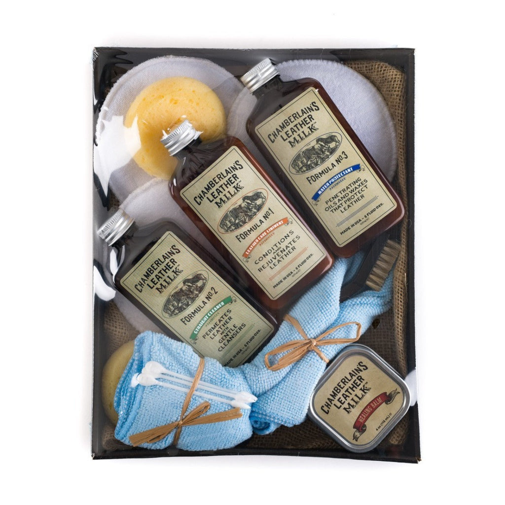 Leather Restoration Kit Chamberlain's Leather Milk, top-down of three bottles, sponges, tin and cloths