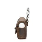 Leather AirPods Pro Case in Dark Coffee Brown, side view with flap closed over the charging case and carabiner clip