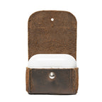 Leather AirPods Pro Case in Dark Coffee Brown, flap open showing the suede lining and closed charging case inside