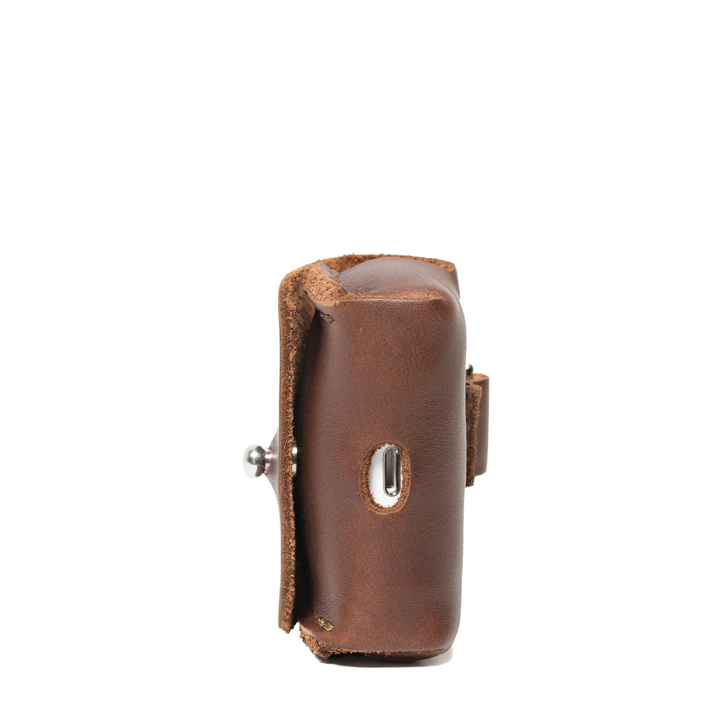 Leather AirPods Pro Case in Chestnut, side view showing the stitched gusset and stud closure