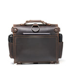 Photographer's Satchel in Dark Coffee Brown, back view with slip pocket, ring and filled side pockets