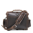 Photographer's Satchel in Dark Coffee Brown, back view with shoulder strap and pad attached