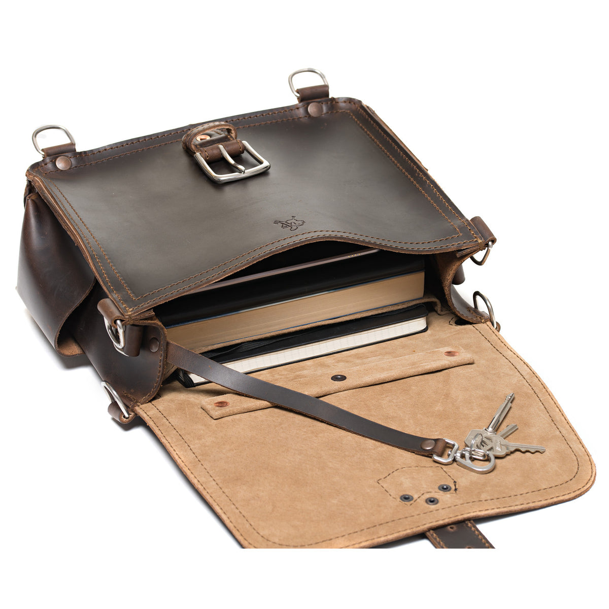 Photographer's Satchel in Dark Coffee Brown, open flap showing books inside and a key leash with keys