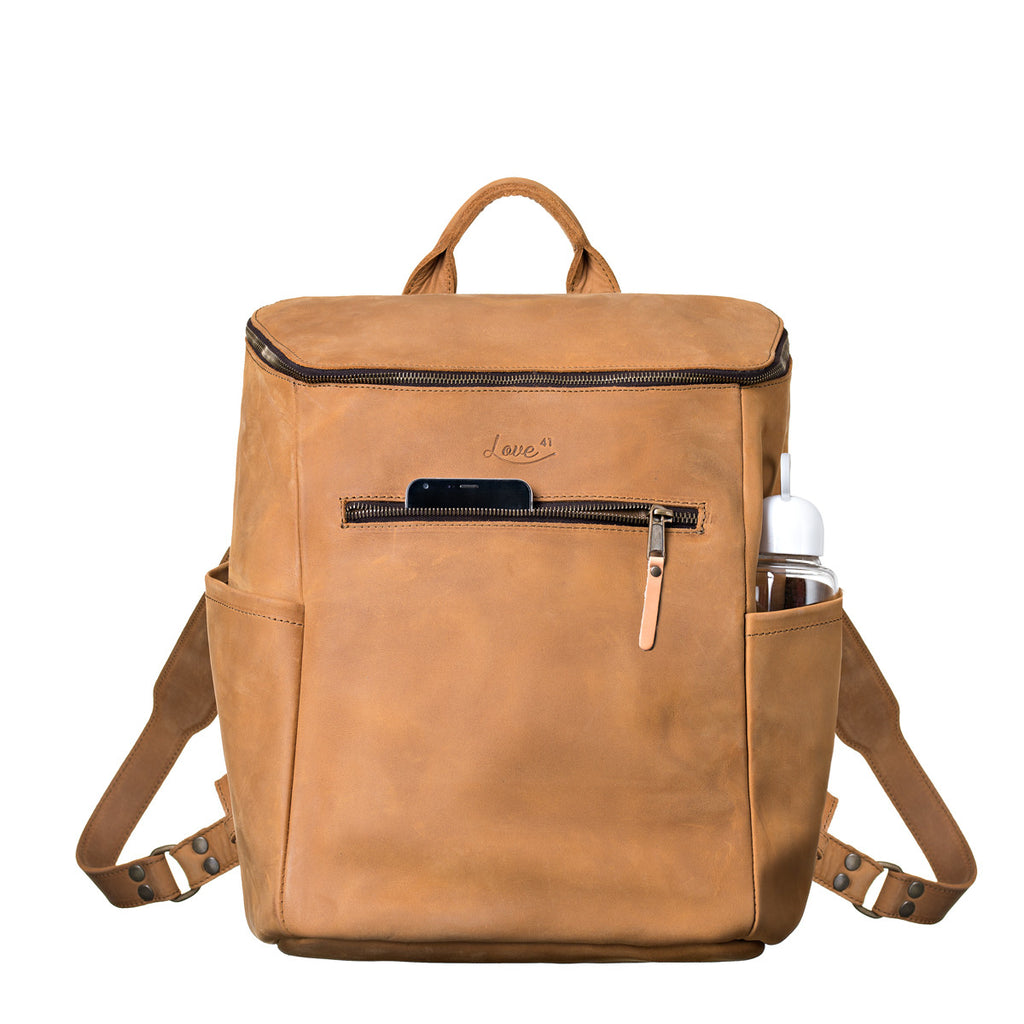 All in One Leather Backpack in Tobacco, front view with a phone in the front pocket and bottle in the side
