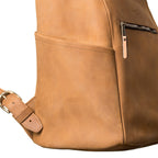 All in One Leather Backpack in Tobacco, close-up of side pocket, zipper pull and strap buckle