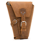 Leather Pistol Wrap in Tobacco, front view folded closed with two buckle straps and logo patch