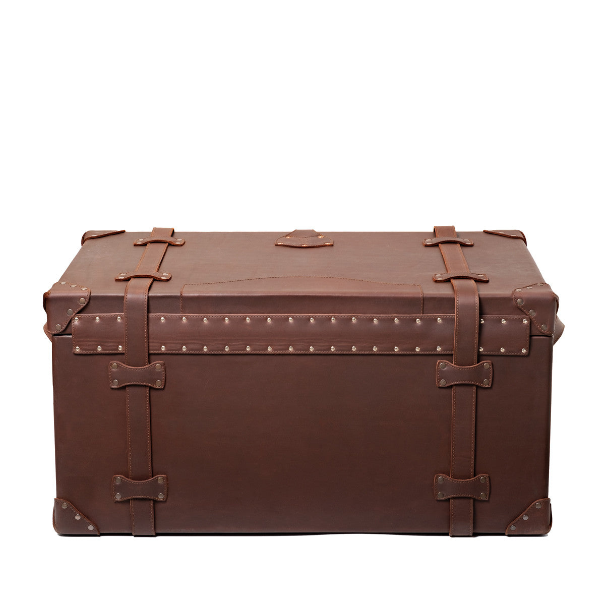 Leather Trunk in Chestnut, closed back view with two vertical straps, studded trim and corner guards