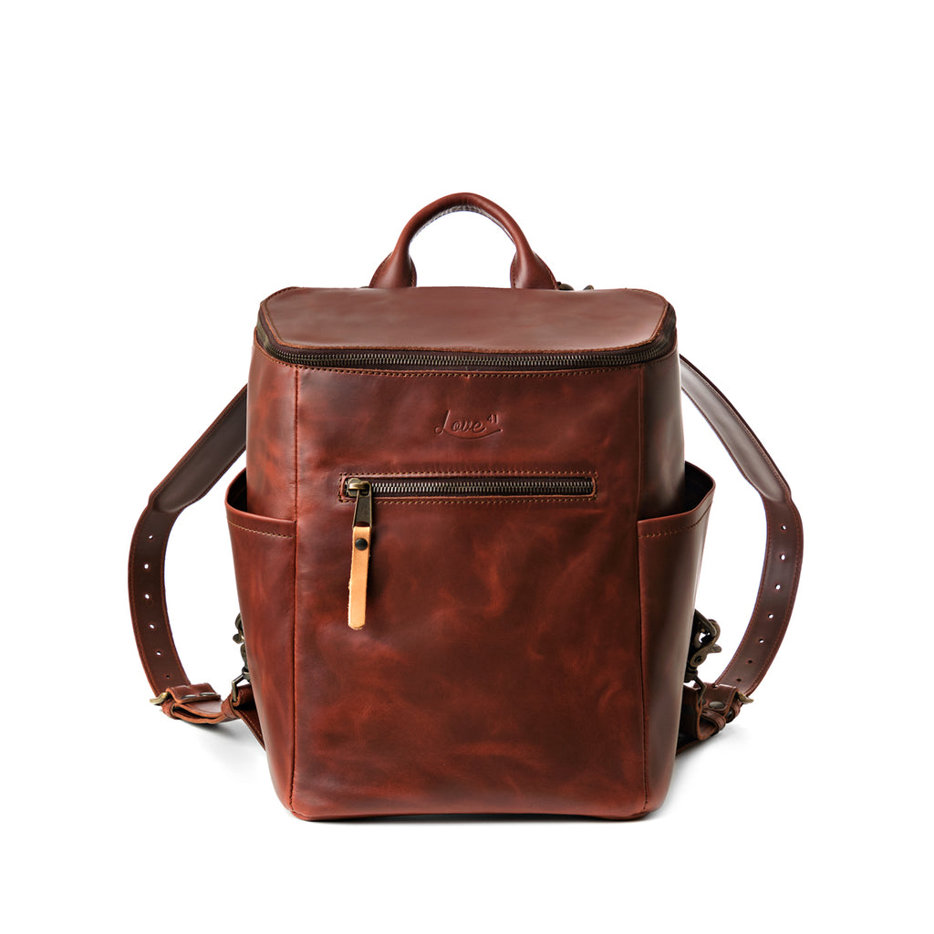 All in One Backpack Medium in Chestnut, front view showing zippered pocket, side pockets and straps
