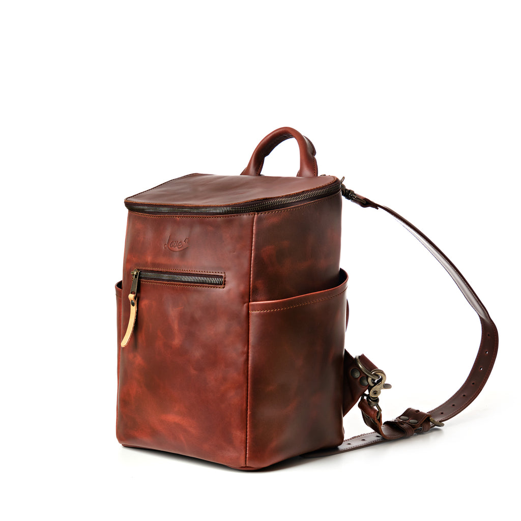 All in One Backpack Medium in Chestnut, angled front view with side pocket and shoulder strap