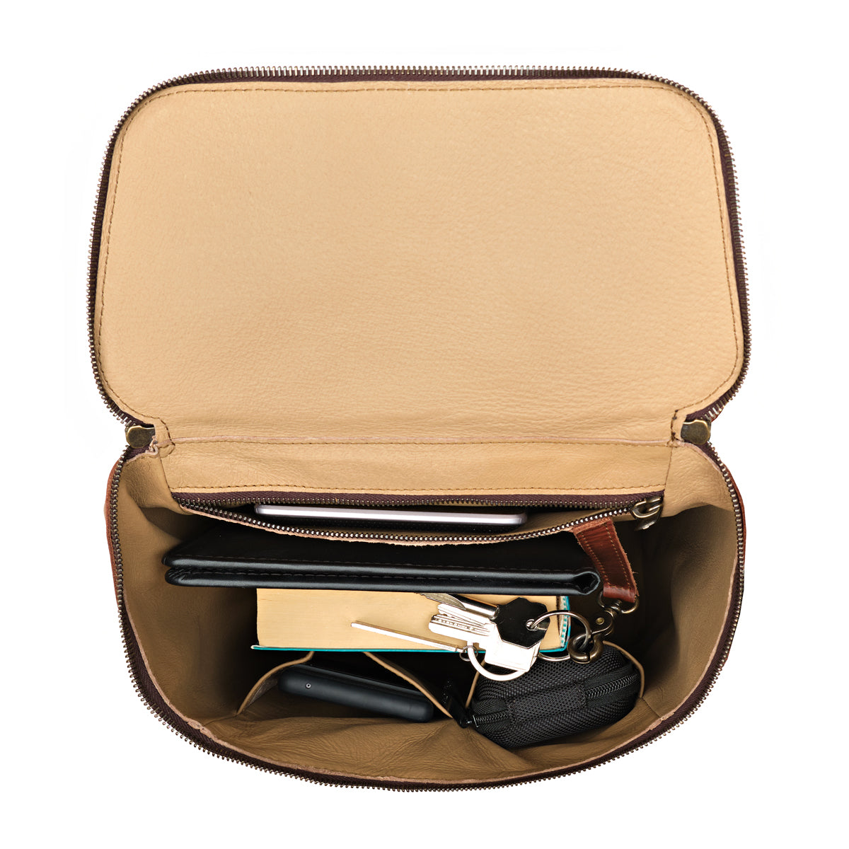 All in One Backpack Medium in Chestnut, open top view of lined interior packed with keys, wallet and pouches