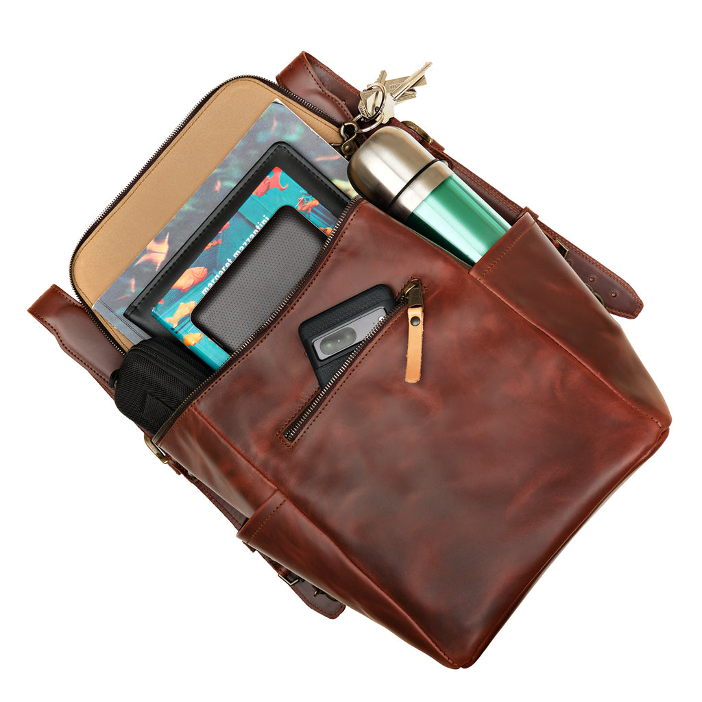 All in One Backpack Medium in Chestnut, packed with a tablet, phone, water bottle and keys