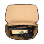 All in One Backpack Medium in Dark Coffee Brown, open top view of lined interior packed with keys, wallet and pouches