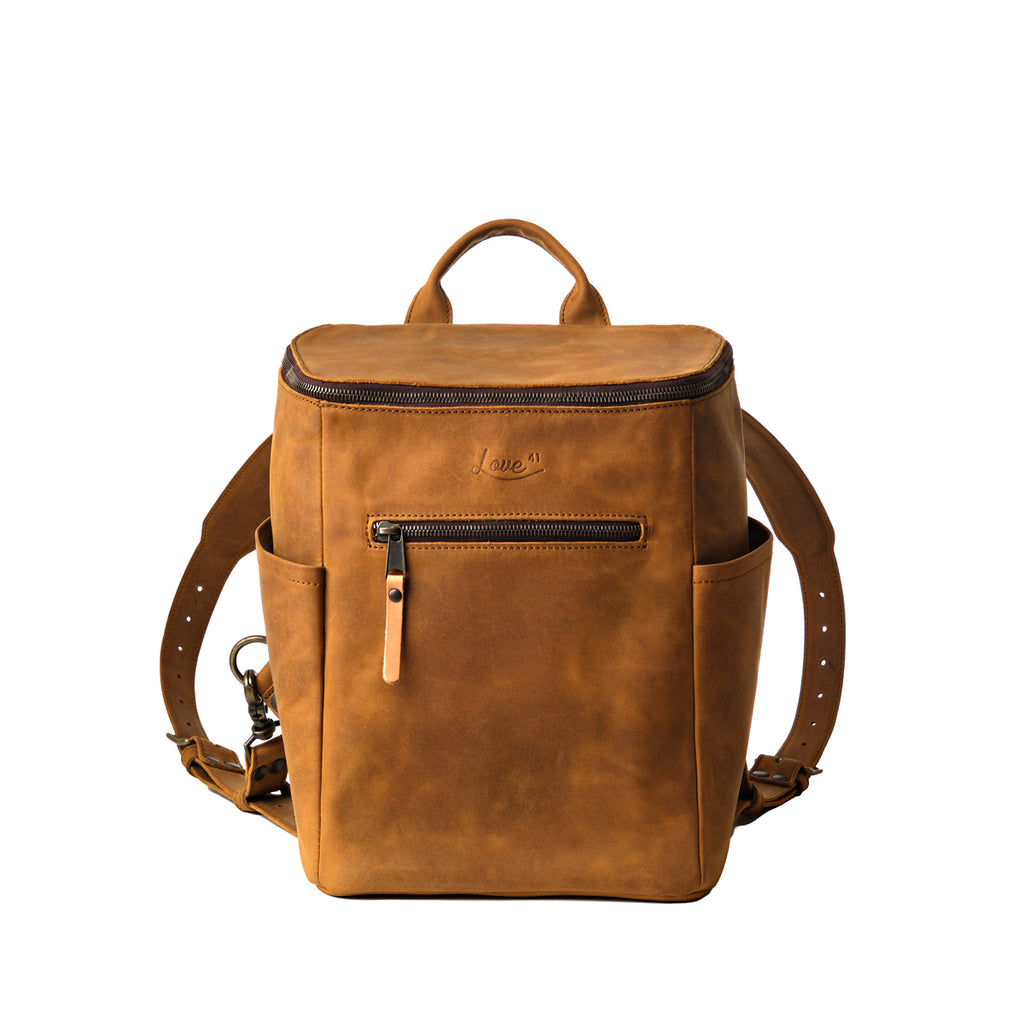 All in One Backpack Medium in Tobacco, front view showing zippered pocket, side pockets and straps