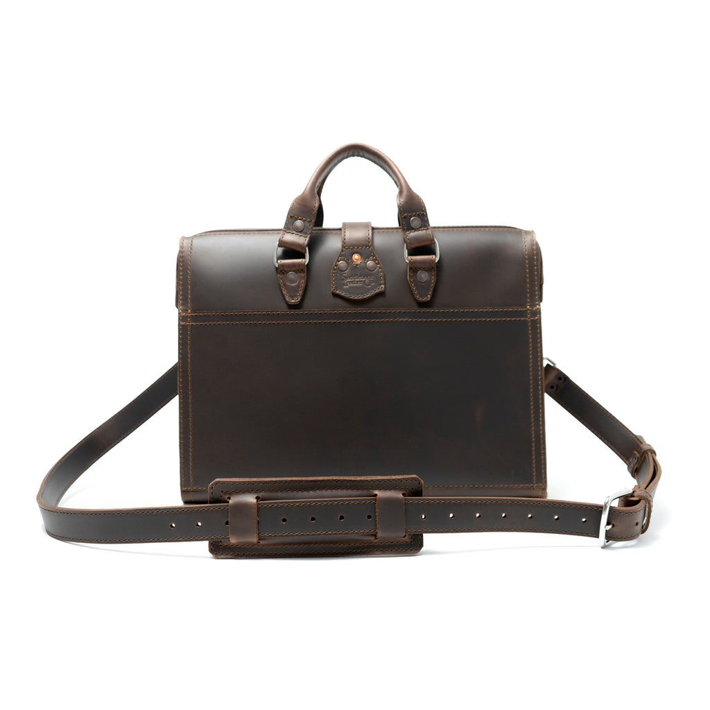 Flight Bag Leather Briefcase in dark brown, back view with slip pocket and padded shoulder strap