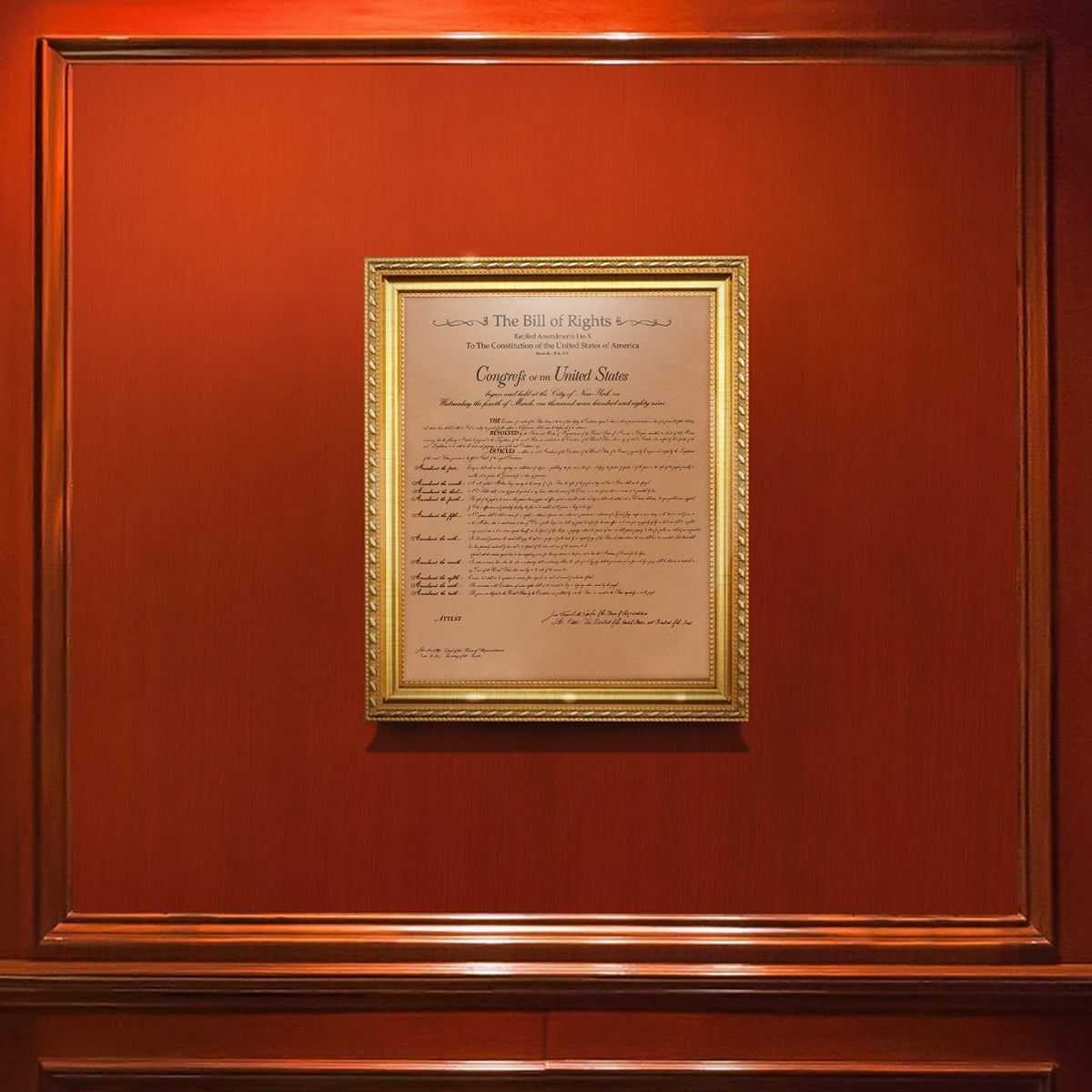 Leather Bill of Rights - Natural in a gold frame hanging on a red wood paneled wall