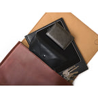 Magnetic Fold Over Bag Large in Chestnut, flap open with a tablet, sunglasses case, wallet and keys inside