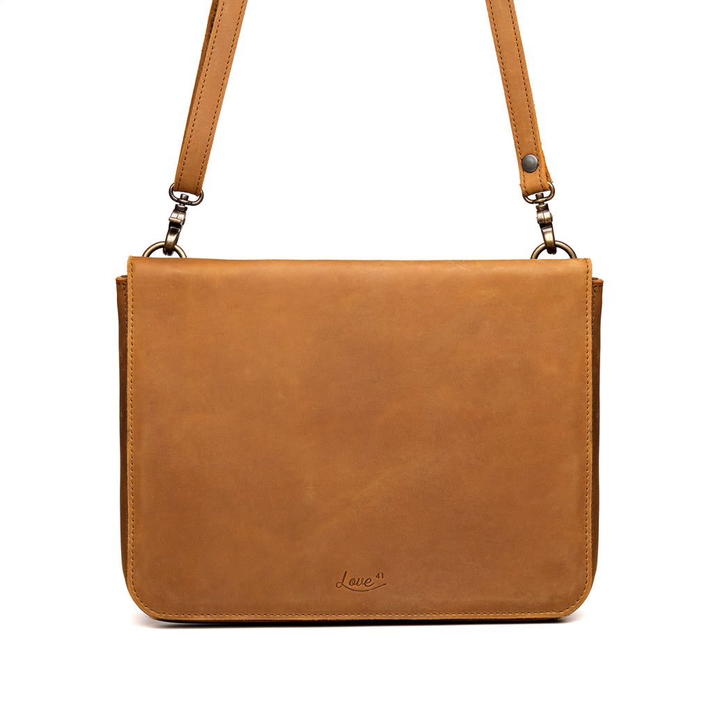 Magnetic Fold Over Bag Large in Tobacco, front view with fold-over flap, embossed logo and shoulder strap