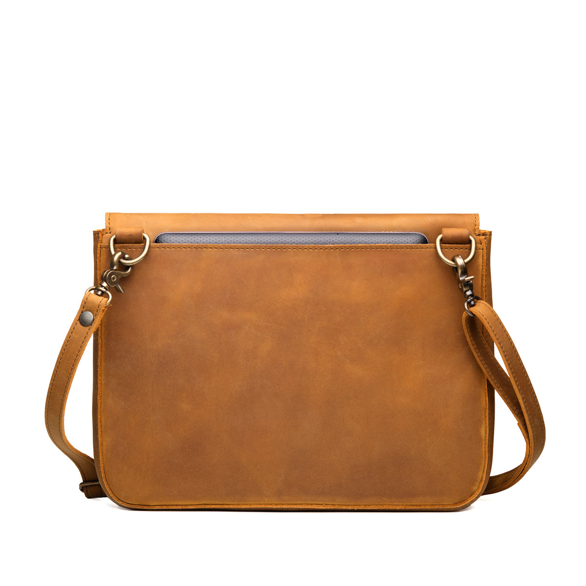 Magnetic Fold Over Bag Large in Tobacco, back view with rear slip pocket holding a laptop and shoulder strap