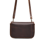Magnetic Fold Over Bag Medium in Dark Coffee Brown, front view with flap closed and shoulder strap