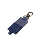 Leather Chapstick Holder in navy blue, empty back view showing suede side and brass swivel clasp