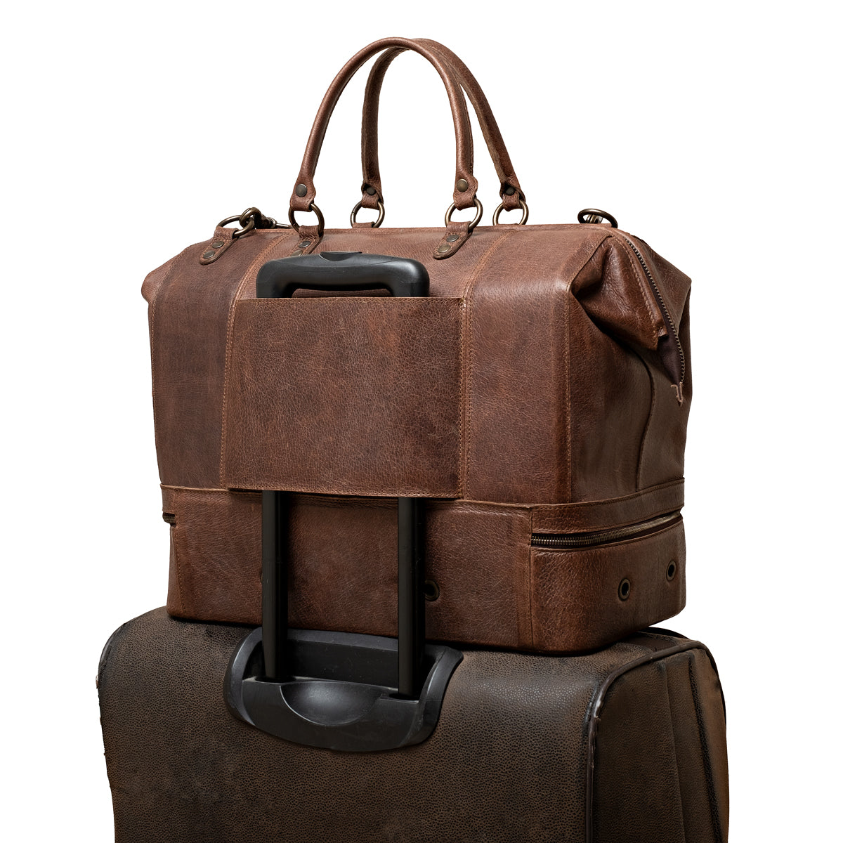 Two Compartment Duffle in Dark Coffee Brown, back trolley sleeve slid over a rolling suitcase handle