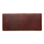 Long Desk Pad in Chestnut, empty top-down view showing stitched border and rounded corners
