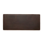 Long Desk Pad in Dark Coffee Brown, empty top-down view showing stitched border and rounded corners