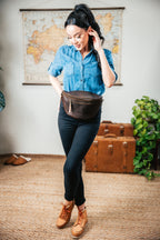 Leather Tumbled Fanny Bag in Dark Coffee Brown, worn at the waist by a woman in a denim shirt