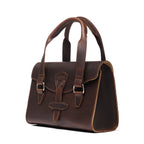 Double Handle Purse in Dark Coffee Brown, angled side view showing the gusset and flap closure