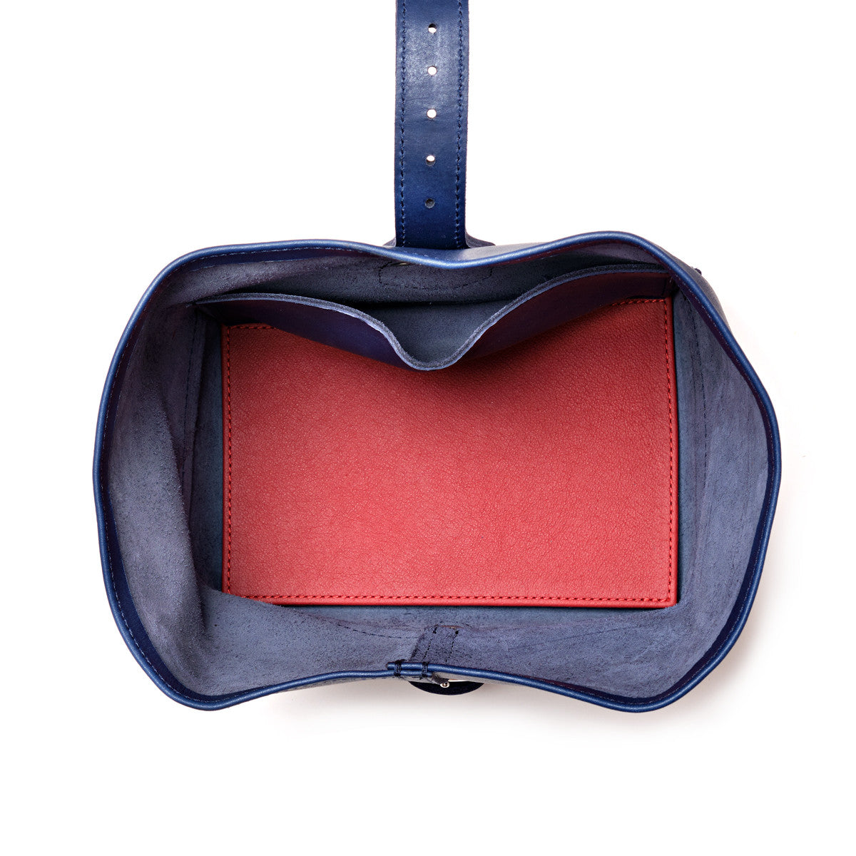 Saddleback Club Membership George Washington Leather Roll-Up Toiletry Bag in Blue, top-down view of red lined interior