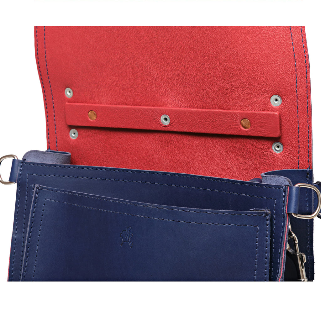 Saddleback Club Membership Paul Revere Leather Messenger Bag Backpack in Red, White and Blue, close-up of riveted flap strap