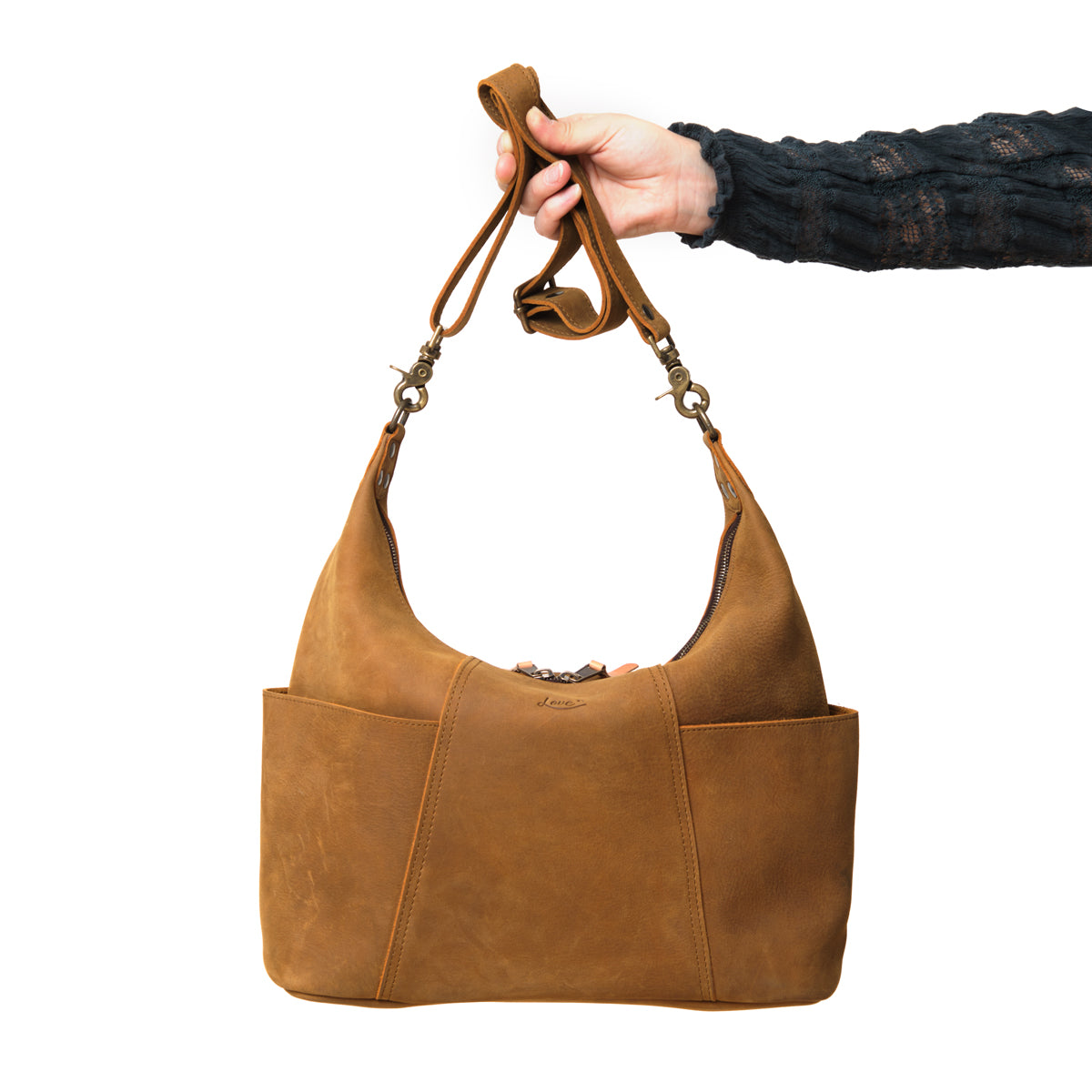 Women's Hobo Organizer Bag in Tobacco, held up by its shoulder strap showing the front pockets