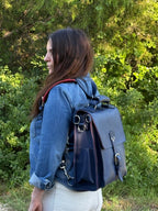 Saddleback Club Membership Paul Revere Leather Messenger Bag Backpack in Red, White and Blue, side view worn as a backpack