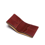 Large Bifold Wallet in Oxblood, open angled view showing the interior card slots