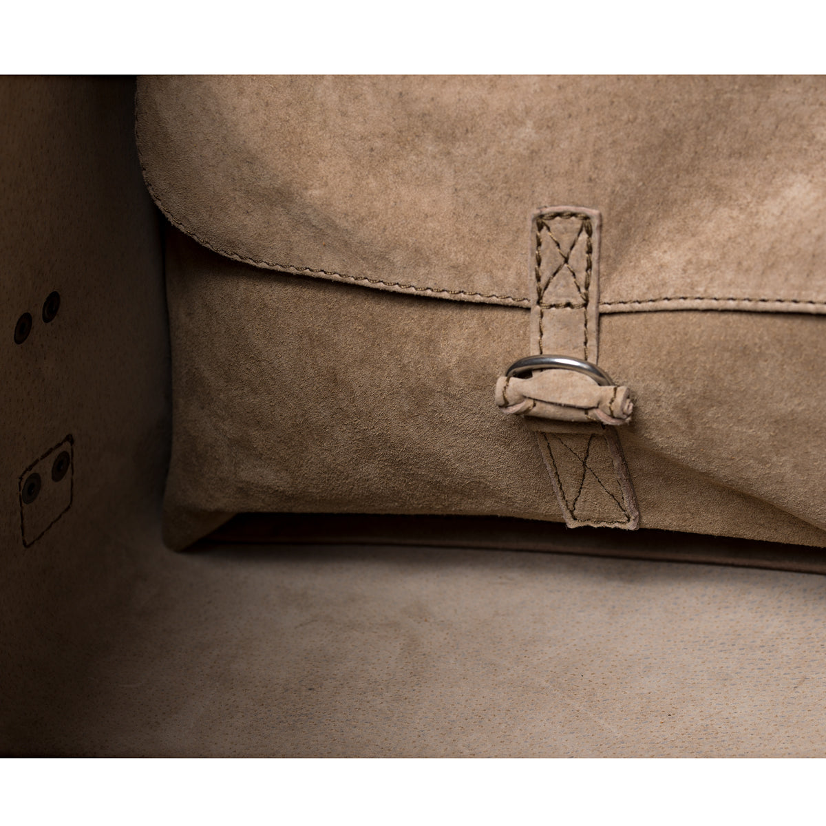 27" Adolescent Beast Duffle Bag in Chestnut, close-up of the suede interior pocket with a stitched ring tab