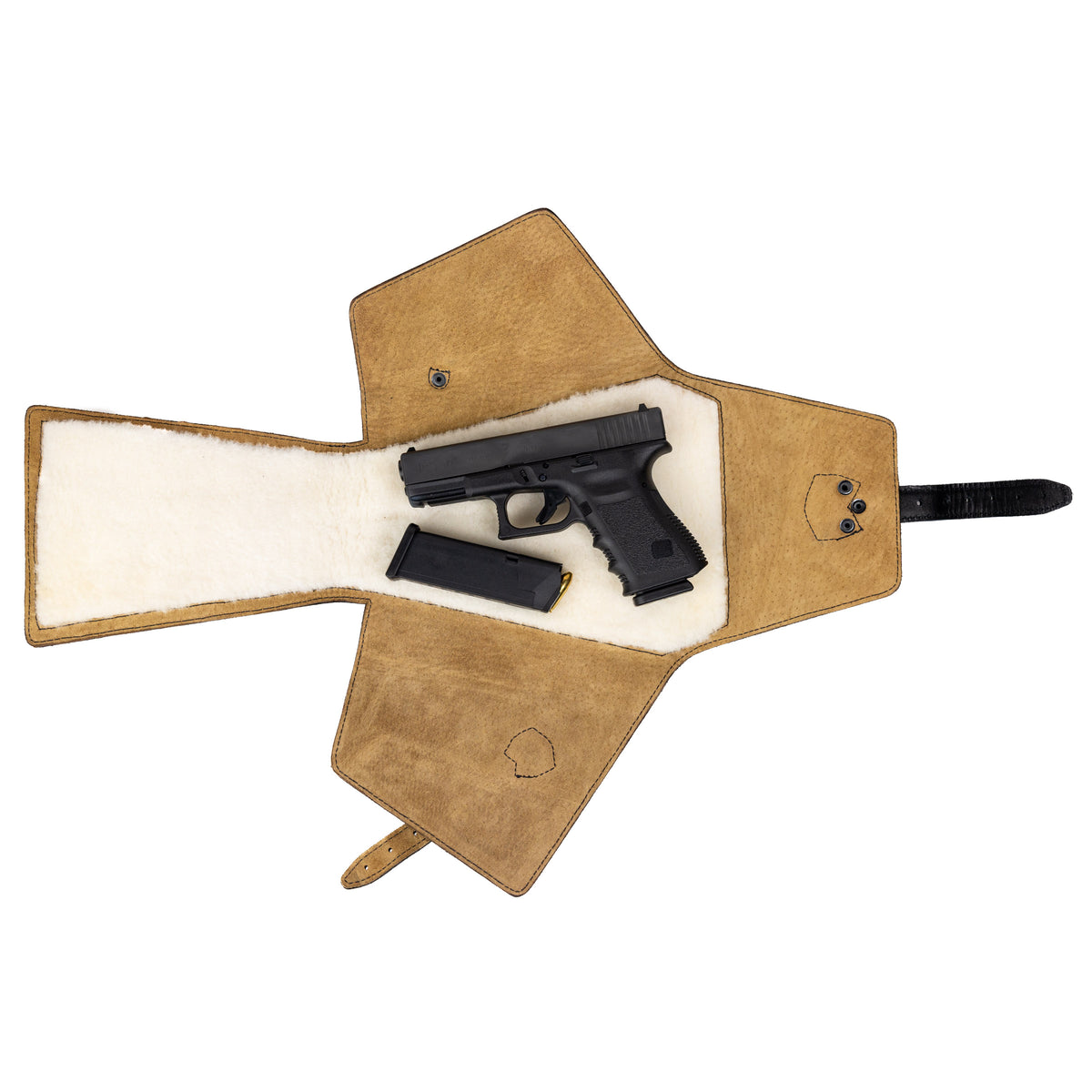 Small Leather Pistol Wrap fully unfolded, showing the suede flaps and fleece lining with a handgun and magazine