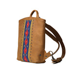 Lanita Leather Backpack in Tobacco, angled side view with woven panel and shoulder strap