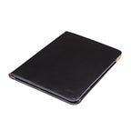 C.S. Lewis Medium Portfolio in Raven Black, closed angled view with debossed logo