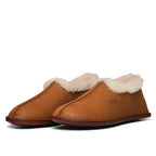 Pair of Sheepskin Moccasins in Tobacco with fleece collars, side view