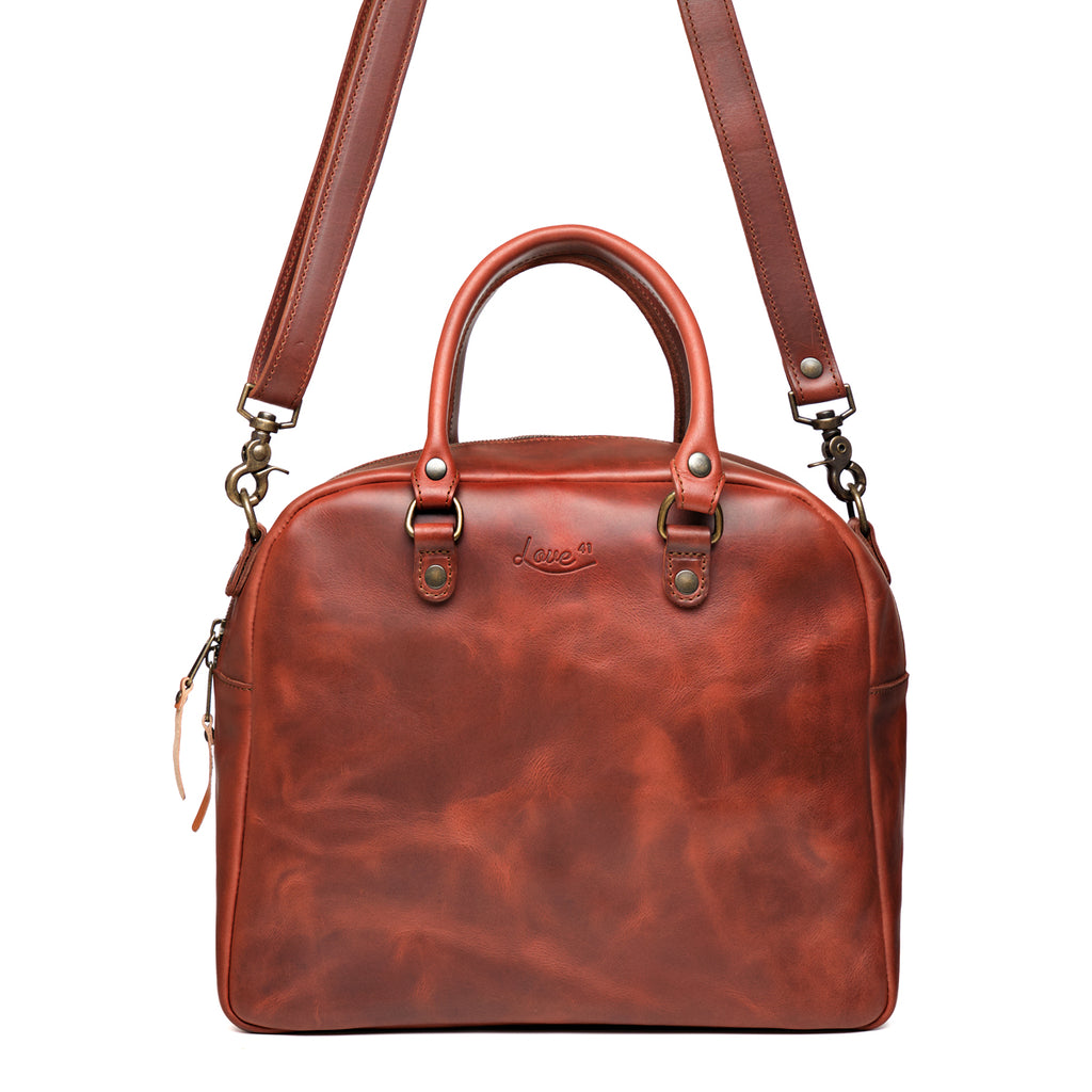 Professional Leather Satchel in Chestnut, front view with top handle and detachable shoulder strap