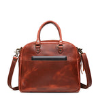 Professional Leather Satchel in Chestnut, back view with a tablet tucked in the rear slip pocket