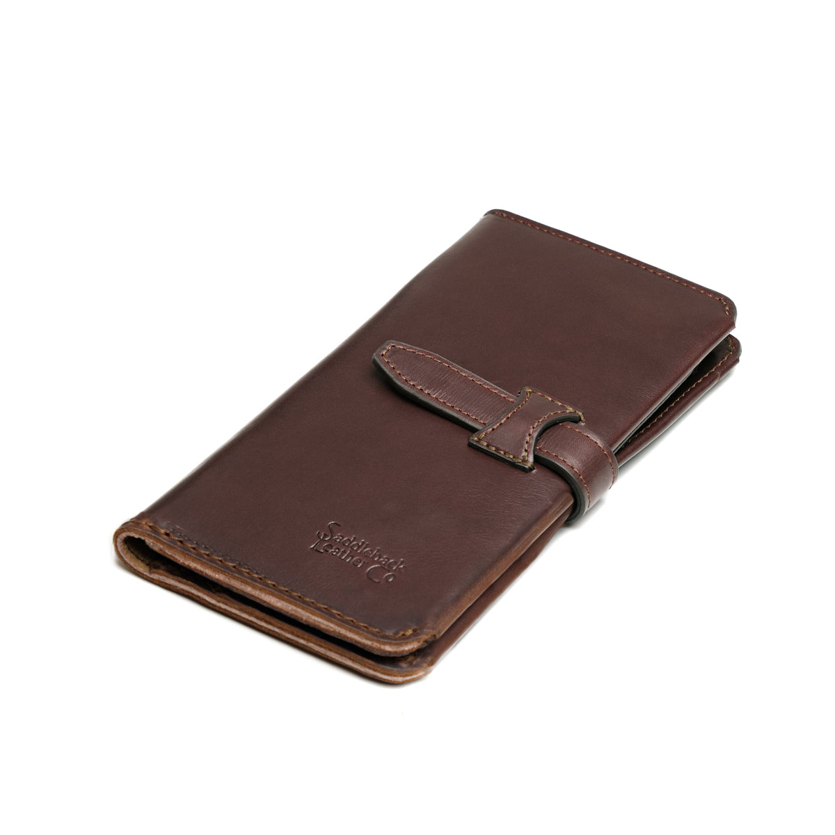 New Big Wallet in Dark Coffee Brown, angled front view lying flat with strap closure