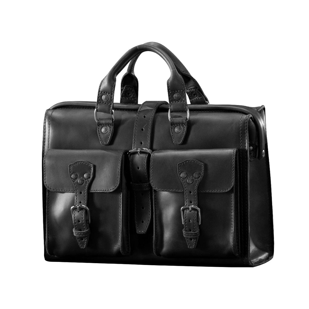 Flight Bag Leather Briefcase in black, angled front view with two buckled pockets and top handles