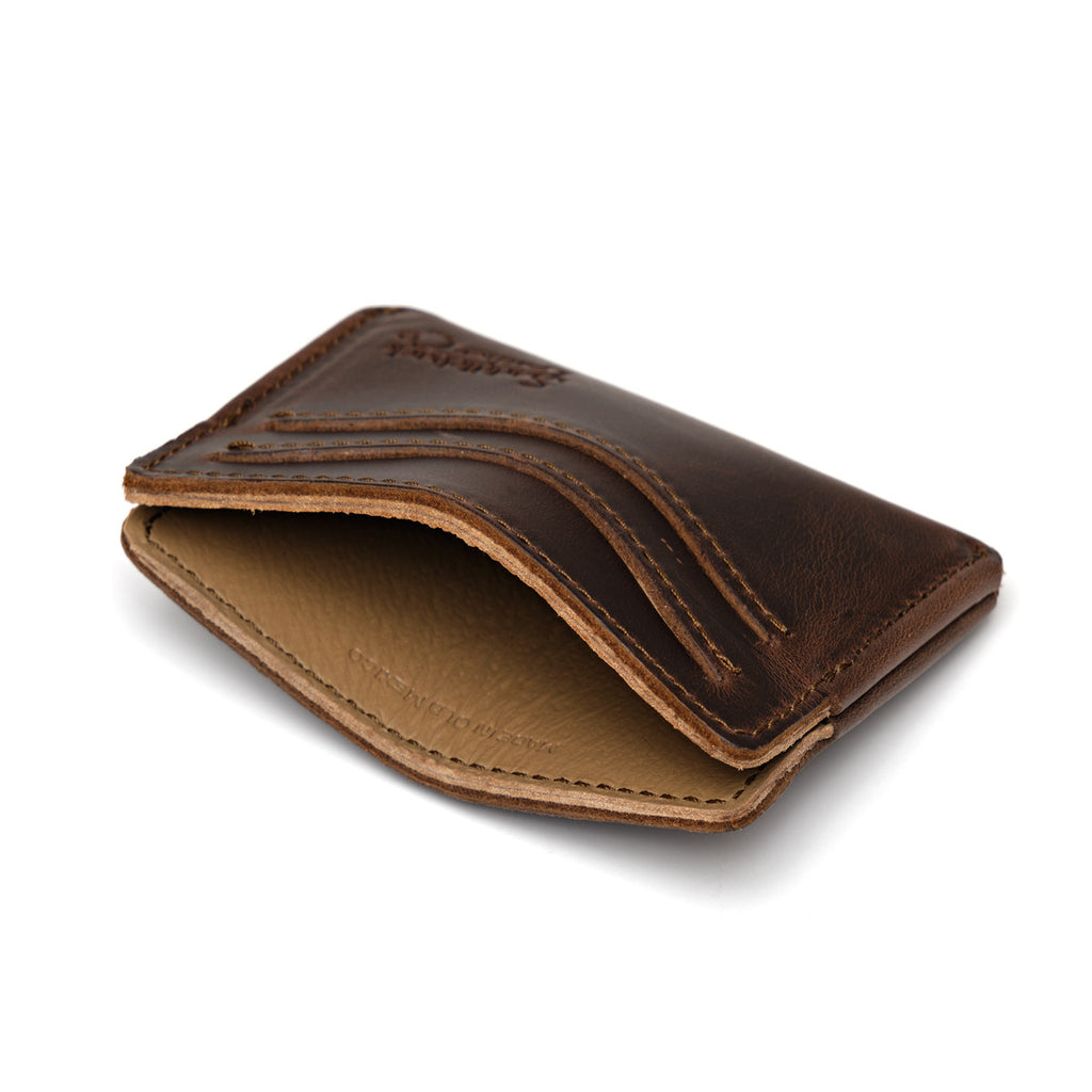 Newton Wallet in Dark Coffee Brown, empty and opened slightly to show the center pocket