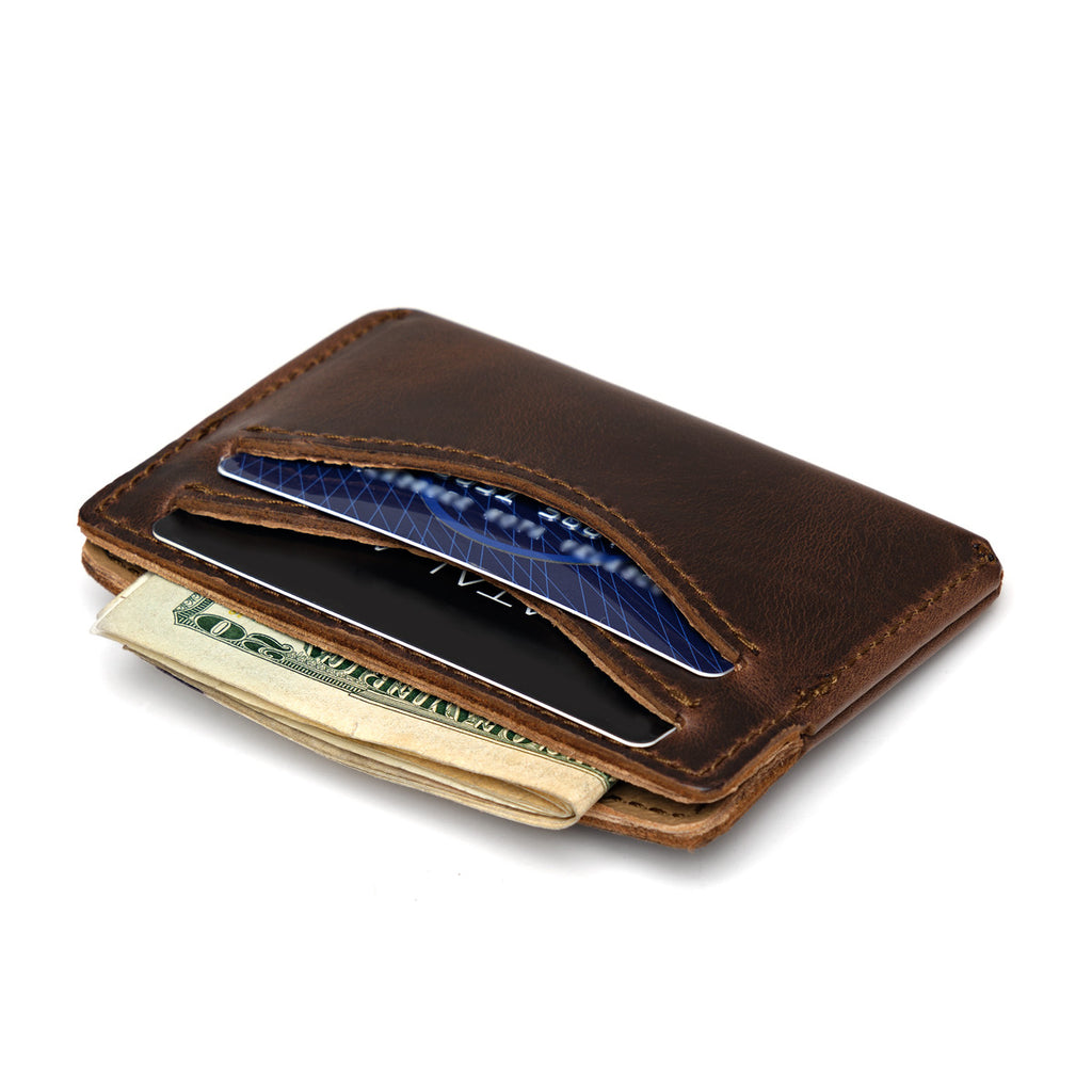 Newton Wallet in Dark Coffee Brown, angled view holding cards and folded cash