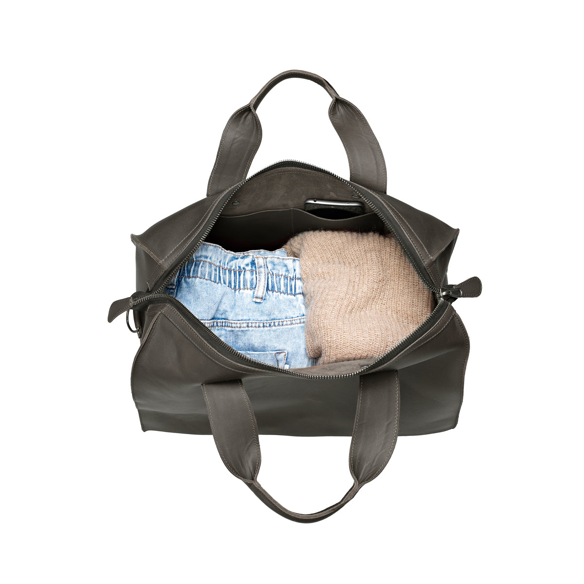 Simple Overnight Leather Duffle Bag in Black, open top packed with folded jeans and a sweater