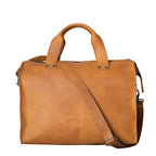 Simple Overnight Leather Duffle Bag in Tobacco, front view with top handles and shoulder strap