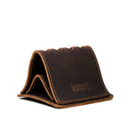 Pen Holder Bell Curve in Dark Coffee Brown leather, empty angled view showing the layered bell curve shape and embossed logo