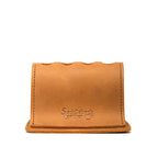 Pen Holder Bell Curve in Tobacco leather, empty front view showing the scalloped top and embossed Saddleback Leather Co. logo
